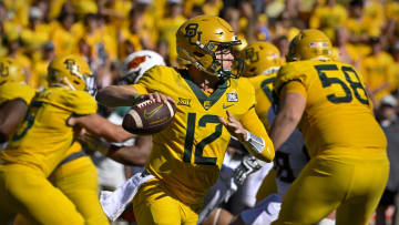 Oct 1, 2022; Waco, Texas, USA; Baylor Bears quarterback Blake Shapen (12) rolls out to pass against