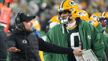 Green Bay Packers head coach Matt LaFleuer and quarterback Jordan Love