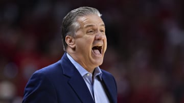 FAYETTEVILLE, ARKANSAS - FEBRUARY 26: Head Coach John Calipari of the Kentucky Wildcats yells at his team in the first half during a game against the Arkansas Razorbacks at Bud Walton Arena on February 26, 2022 in Fayetteville, Arkansas. (Photo by Wesley Hitt/Getty Images)