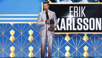 NASHVILLE, TENNESSEE - JUNE 26: Erik Karlsson of the San Jose Sharks accepts the James Norris Memorial Trophy during the 2023 NHL Awards at Bridgestone Arena on June 26, 2023 in Nashville, Tennessee. (Photo by Jason Kempin/Getty Images )
