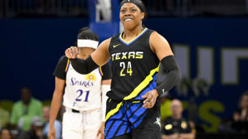 Jul 22, 2023; Arlington, Texas, USA; Dallas Wings guard Arike Ogunbowale (24) celebrates during the second half against the Los Angeles Sparks at College Park Center. Mandatory Credit: Jerome Miron-USA TODAY Sports