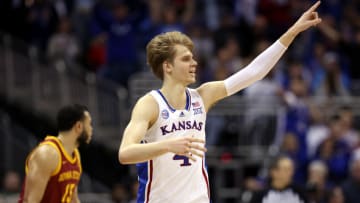 KANSAS CITY, MISSOURI - MARCH 10: Gradey Dick #4 of the Kansas Jayhawks reacts after making a three-pointer during the Big 12 Tournament game against the Iowa State Cyclones at T-Mobile Center on March 10, 2023 in Kansas City, Missouri. (Photo by Jamie Squire/Getty Images)