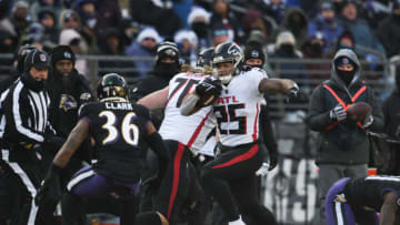Dec 24, 2022; Baltimore, Maryland, USA; Atlanta Falcons running back Tyler Allgeier (25) rushes during the first half against the Baltimore Ravens at M&T Bank Stadium. Mandatory Credit: Tommy Gilligan-USA TODAY Sports