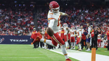 Dec 18, 2022; Houston, Texas, USA; Kansas City Chiefs quarterback Patrick Mahomes (15) scores a touchdown during the game against the Houston Texans at NRG Stadium. Mandatory Credit: Troy Taormina-USA TODAY Sports