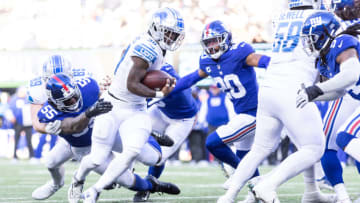 EAST RUTHERFORD, NEW JERSEY - NOVEMBER 20: Jamaal Williams #30 of the Detroit Lions scores a touchdown against the New York Giants during the second quarter at MetLife Stadium on November 20, 2022 in East Rutherford, New Jersey. (Photo by Dustin Satloff/Getty Images)
