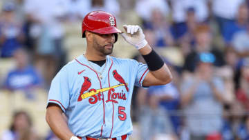 Albert Pujols #5 of the St. Louis Cardinals gestures to the applause of the crowd as he steps into the batters box during the first inning against the Los Angeles Dodgers at Dodger Stadium on September 24, 2022 in Los Angeles, California. (Photo by Harry How/Getty Images)
