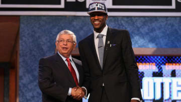 NEWARK, NJ - JUNE 28: Michael Kidd-Gilchrist (R) of the Kentucky Wildcats greets NBA Commissioner David Stern (L) after he was selected number two overall by the Charlotte Bobcats during the first round of the 2012 NBA Draft at Prudential Center on June 28, 2012 in Newark, New Jersey. NOTE TO USER: User expressly acknowledges and agrees that, by downloading and/or using this Photograph, user is consenting to the terms and conditions of the Getty Images License Agreement. (Photo by Elsa/Getty Images)