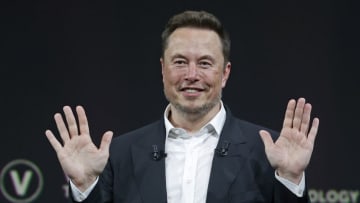 PARIS, FRANCE - JUNE 16: Chief Executive Officer of SpaceX and Tesla and owner of Twitter, Elon Musk gestures as he attends the Viva Technology conference dedicated to innovation and startups at the Porte de Versailles exhibition centre on June 16, 2023 in Paris, France. Elon Musk is visiting Paris for the VivaTech show where he gives a conference in front of 4,000 technology enthusiasts. He also took the opportunity to meet Bernard Arnaud, CEO of LVMH and the French President. Emmanuel Macron, who has already met Elon Musk twice in recent months, hopes to convince him to set up a Tesla battery factory in France, his pioneer company in electric cars. (Photo by Chesnot/Getty Images)