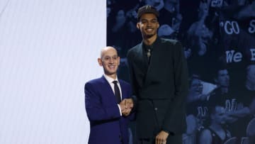 NEW YORK, NEW YORK - JUNE 22: Victor Wembanyama (R) poses with NBA commissioner Adam Silver (L) after being drafted first overall pick by the San Antonio Spurs during the first round of the 2023 NBA Draft at Barclays Center on June 22, 2023 in the Brooklyn borough of New York City. NOTE TO USER: User expressly acknowledges and agrees that, by downloading and or using this photograph, User is consenting to the terms and conditions of the Getty Images License Agreement. (Photo by Sarah Stier/Getty Images)