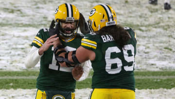 Green Bay Packers QB Aaron Rodgers and OL David Bakhtiari (Photo by Stacy Revere/Getty Images)