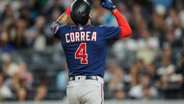 NEW YORK, NY - SEPTEMBER 07: Carlos Correa #4 of the Minnesota Twins celebrates after hitting a home run against the New York Yankees on September 7, 2022 at Yankee Stadium in New York, New York. (Photo by Brace Hemmelgarn/Minnesota Twins/Getty Images)