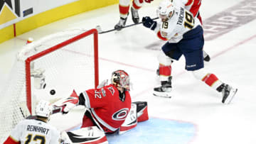 RALEIGH, NORTH CAROLINA - MAY 20: Matthew Tkachuk #19 of the Florida Panthers scores the game winning goal on Antti Raanta #32 of the Carolina Hurricanes in overtime in Game Two of the Eastern Conference Final of the 2023 Stanley Cup Playoffs at PNC Arena on May 20, 2023 in Raleigh, North Carolina. (Photo by Grant Halverson/Getty Images)