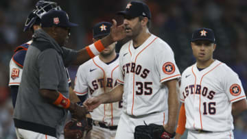 May 4, 2022; Houston, Texas, USA; Houston Astros manager Dusty Baker Jr. (12) pulls starting pitcher Justin Verlander (35) out of the game against the Seattle Mariners in the seventh inning at Minute Maid Park. Mandatory Credit: Thomas Shea-USA TODAY Sports